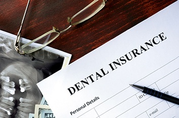 Dental insurance form lying on a table