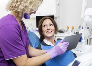 a patient attending her dental implant consultation