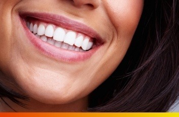 Close up of a smile with straight white teeth