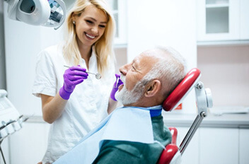 a patient undergoing dental implant salvage treatment