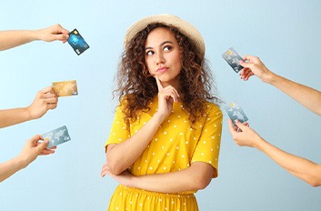 Woman surrounded by credit cards